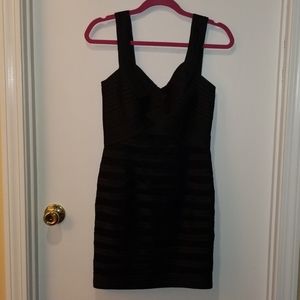 Black cocktail dress.  S.
